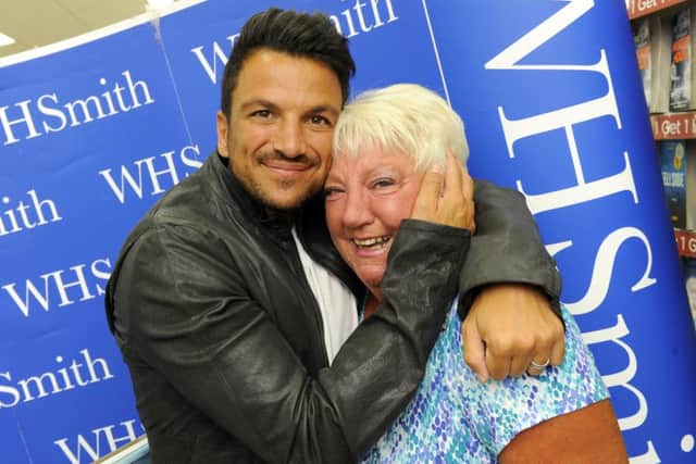 Margaret Cox, 72, from Portsmouth was overwelmed when she met Peter Andre today Picture: Malcolm Wells (160906-5411)