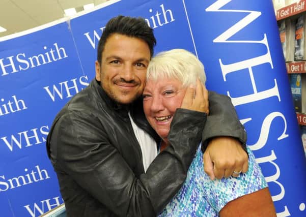 Margaret Cox, 72, from Portsmouth was overwelmed when she met Peter Andre today Picture: Malcolm Wells (160906-5411)