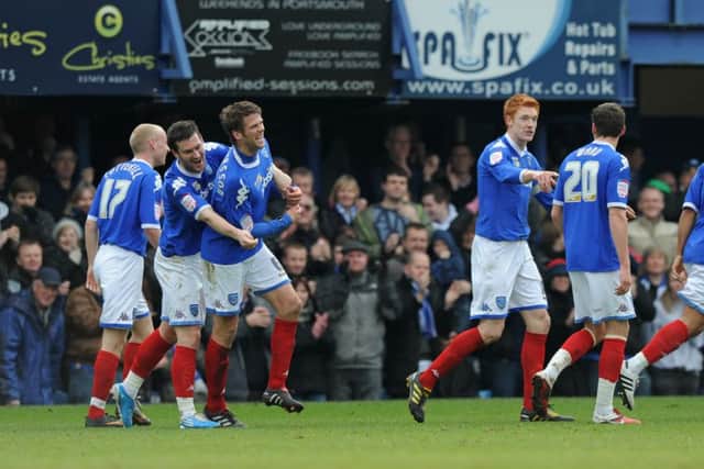 Goalscorer Hermann Hreidarsson & Co celebrate during the 1-0 win against Sheffield United in March 2011
