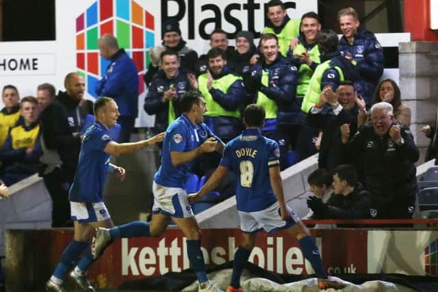 Michael Doyle celebrates his goal at Accrington last season Picture: Joe Pepler
