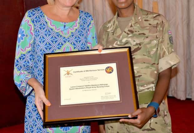 Lance Corporal Tabitha Ndirangu with Gosport MP Caroline DinenageFrom