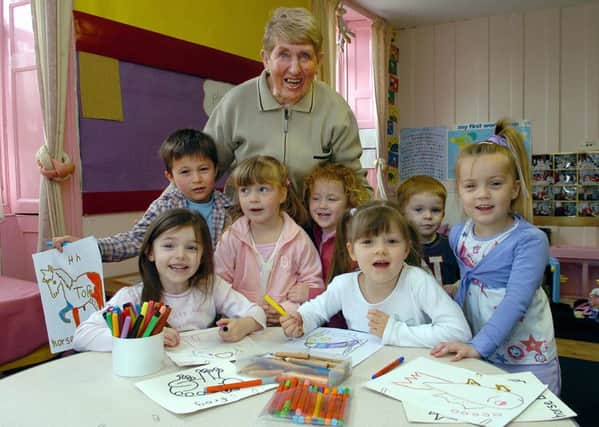 Marian Howe with some of the children at Havant Nursery in The Pallant in 2006
