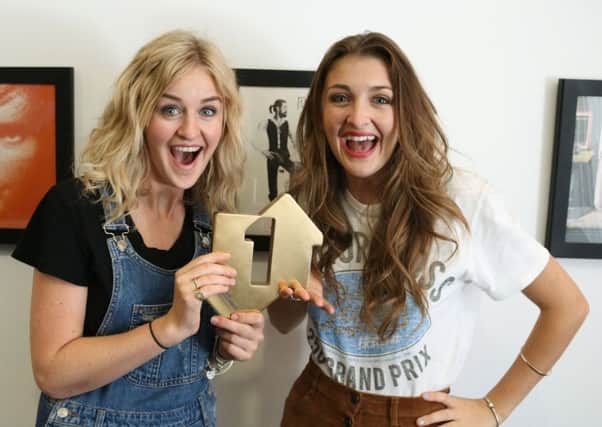 Twin sisters Catherine and Lizzy Ward Thomas have gone straight in at the top with their second studio album Cartwheels, beating Jamie T and his new album Trick. See PA story SHOWBIZ Charts. Photo credit: Official Charts Company