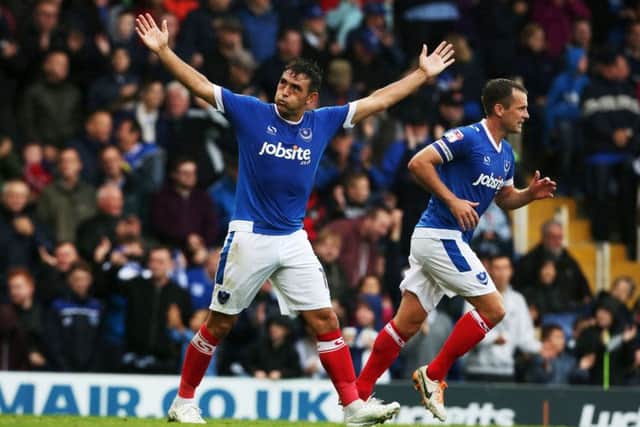 Gary Roberts enjoys his goal in front of the Fratton End Picture: Joe Pepler