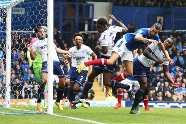 Christian Burgess scores Pompey's equaliser against Wycombe Picture: Joe Pepler