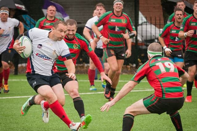 Martin Hoskins on his way to score a try against Millbrook. Picture: Keith Woodland