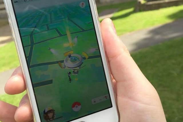 Playing Pokemon Go