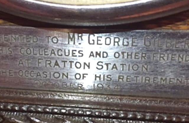The  brass plate on the clock