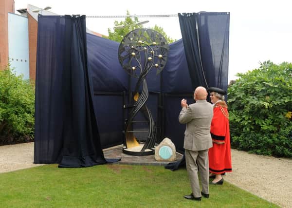 The sculpture being unveiled in the grounds of Westbury Manor Museum.

Picture: Sarah Standing (161278-6906)