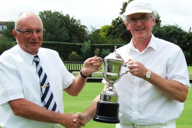 Charlie Bailey, right, receives his trophy
