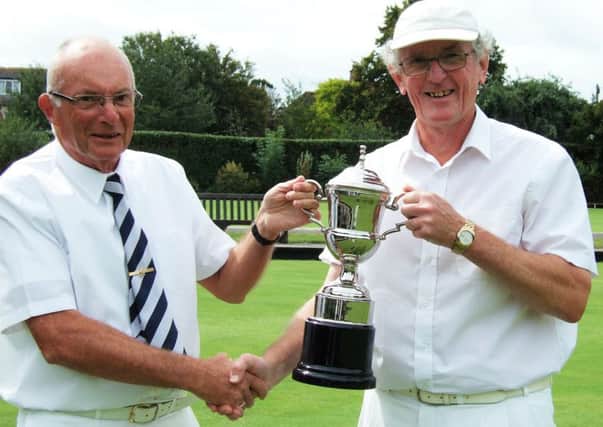 Charlie Bailey, right, receives his trophy