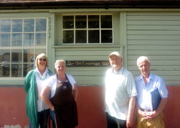 Philippa Dickinson, Heather Ewing, Michael Whitaker and Terry Hinkley outside The Old Cooperage at Royal Clarence Yard