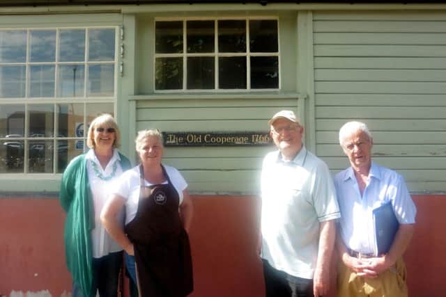 Philippa Dickinson, Heather Ewing, Michael Whitaker and Terry Hinkley outside The Old Cooperage at Royal Clarence Yard