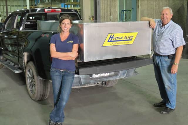 Don Mahnke, president and Janine Smith, vice president at Hydra-Slide, with a new LP350 being shipped to Rapid Response Solutions in Dundas Lane, Portsmouth
