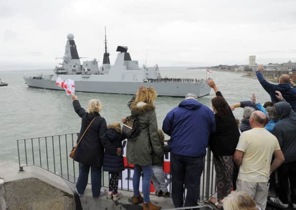 Several hundred families and friends waved off HMS Daring on September 2 as she left Portsmouth for nine months in the Gulf Picture:  Malcolm Wells (160902-4642)