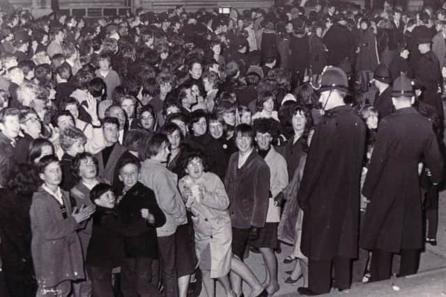 Little Angus McCrudden, front left, alongside his 'banned' friend Mickey Lenton