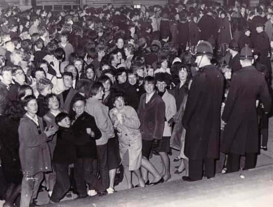 Little Angus McCrudden, front left, alongside his 'banned' friend Mickey Lenton
