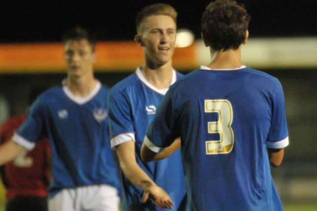 Adam May congratulates Kal Naismith on his goal. Picture: Mick Young (161148-11)