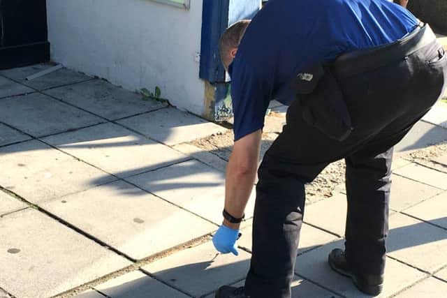 Forensics and blood outside Kensington Hair in Highland Road, Southsea, on September 13. Picture: Ben Fishwick
