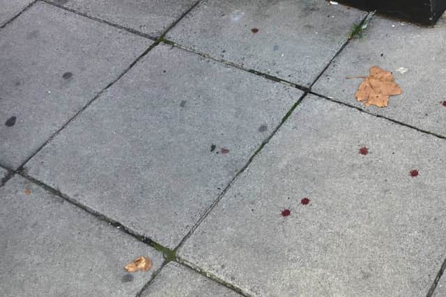 Forensics and blood outside Kensington Hair in Highland Road, Southsea, on September 13. Picture: Ben Fishwick