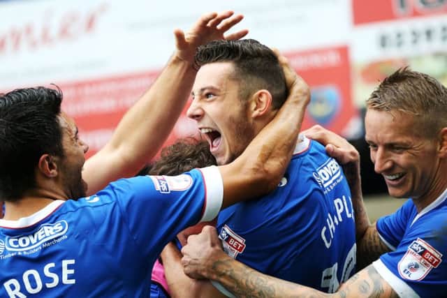 Conor Chaplin is congratulated by his team-mates follwoing his goal against Wycombe last Saturday Picture: Joe Pepler