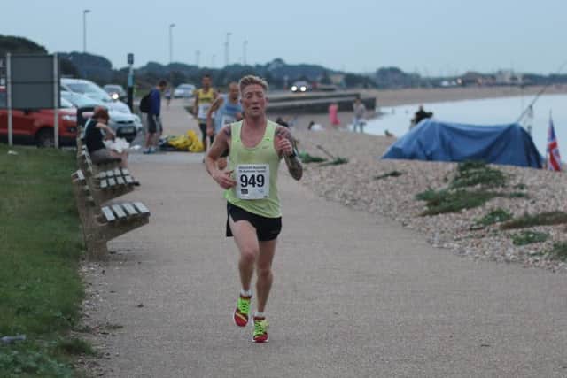 Gareth Smith powers to victory in the 5k race in Gosport. Picture: David Brawn