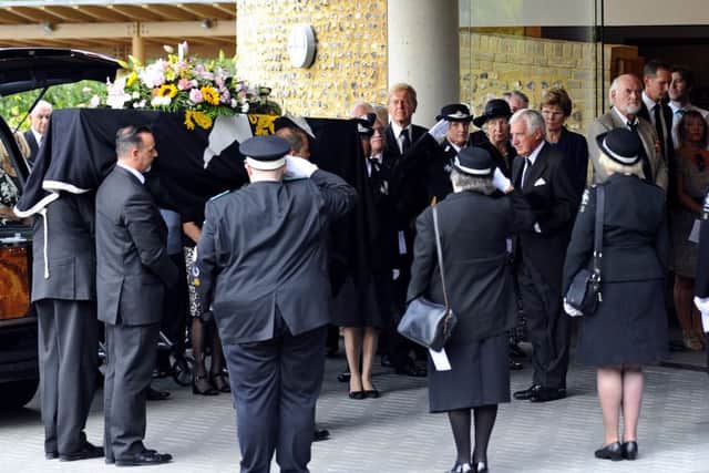 The coffin of Brenda 'Penny' Moss, a former Mayor of Havant, is taken into The Oaks crematorium Picture: Malcolm Wells (160915-0528)
