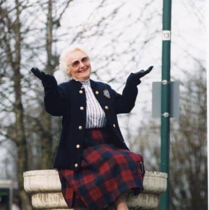 Penny Moss by a broken fountain in Waterlooville in March 1996