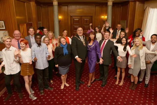 Students and lecturers with Cllr Donna Jones, Mayor David Fuller, his consort Leza Tremorin and Cllr Neill Young at the front Picture: Habibur Rahman (161306-78)