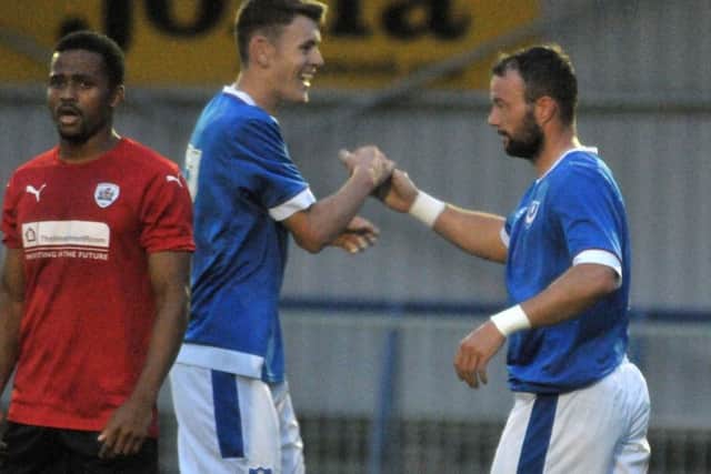 Noel Hunt, right, celebrates his goal against Barnsley in Monday nights Premier League Cup game at Westleigh Park with Blues team-mate Ben Tollitt Picture: Mick Young