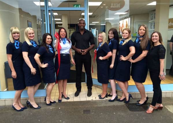 Vincent Pericard with the staff of Thomson in North End, which has undergone a refurbishment Picture: Laura Allen