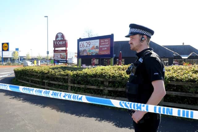 Police outside the Toby Carvery in Hilsea after the raid