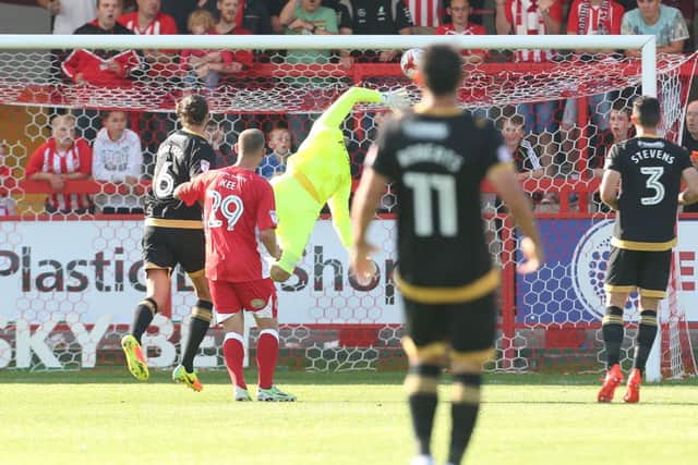 Paddy Lacey scores the winner for Accrington Picture: Joe Pepler