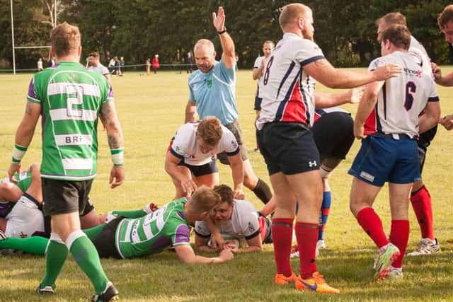 Dave Reed caps the win with United Services' final try. Picture: Keith Woodland