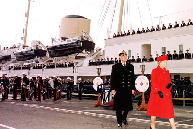 RW 18-01-12 ROYAL BRITANNIA REP: COFile dated 11/12/97 of The Duke of Edinburgh and The Queen leaving the Royal Yacht Britannia for the last time in Portsmouth. The Duke reaches a personal milestone on Sunday (June 10, 2001) when he celebrates his 80th birthday. Picture to accompany PA stories ROYAL Philip. PA photos ENGPPP00120120117125322