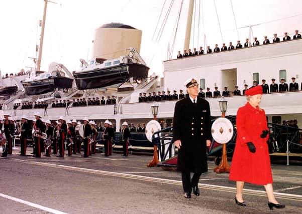 RW 18-01-12 ROYAL BRITANNIA REP: CO

File dated 11/12/97 of The Duke of Edinburgh and The Queen leaving the Royal Yacht Britannia for the last time in Portsmouth. The Duke reaches a personal milestone on Sunday (June 10, 2001) when he celebrates his 80th birthday. Picture to accompany PA stories ROYAL Philip. PA photos ENGPPP00120120117125322