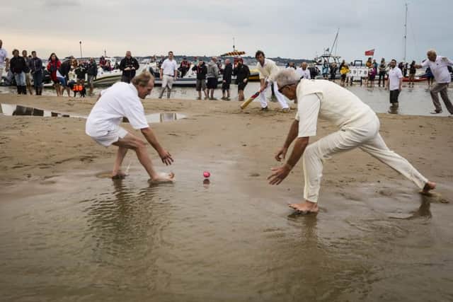 Match action during the annual Bramble Bank cricket match
Picture: Ben Birchall/PA Wire