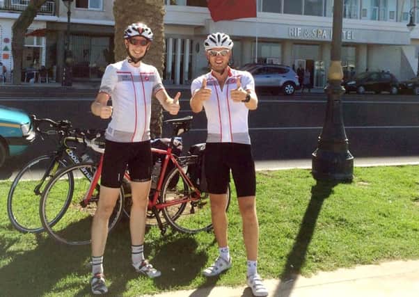 From left, Tom Miller and friend Leo Maliphant cycled to Africa