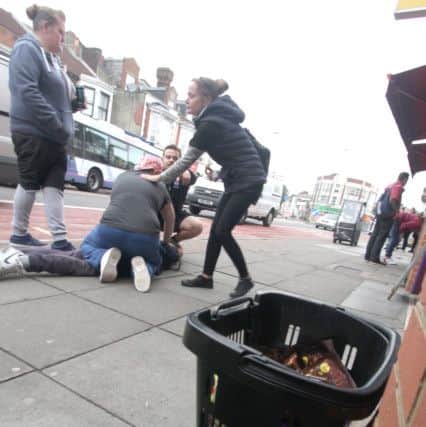 A man was pinned to the ground outside Poundland in North End after allegedly trying to steal chocolate