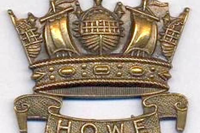 The Howe Division crest.