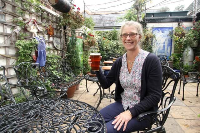 Landlady Judy Burr in the gardenof the Barley Mow in Southsea Picture:Habibur Rahman