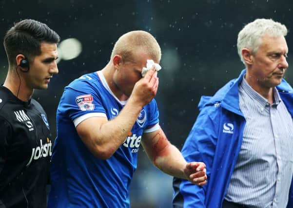 Pompey striker Curtis Main cut his head during a clash with Wycombe Wanderers earlier this month    Picture: Joe Pepler