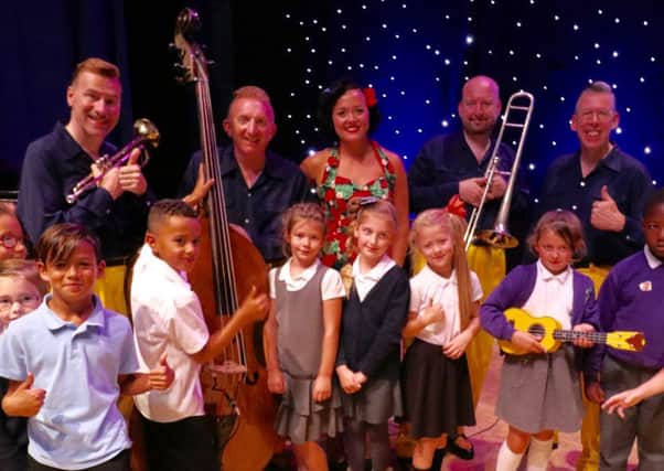 The Jive Aces and schoolchildren. All picture credits: Paul Taylor