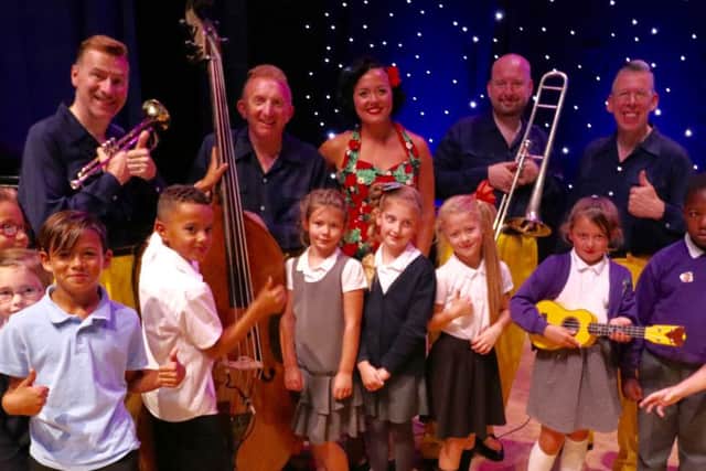 The Jive Aces and schoolchildren. All picture credits: Paul Taylor