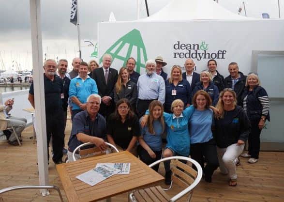 Danni Crutcher, Megan Eddles and Sophie Smith celebrating completing the Gosport Marine Futures programme with organisers at Southampton Boat Show