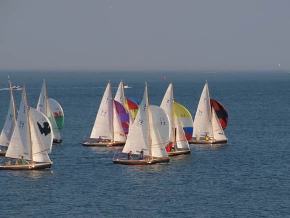 Sailing boats out on The Solent in a previous Portsmouth Regatta