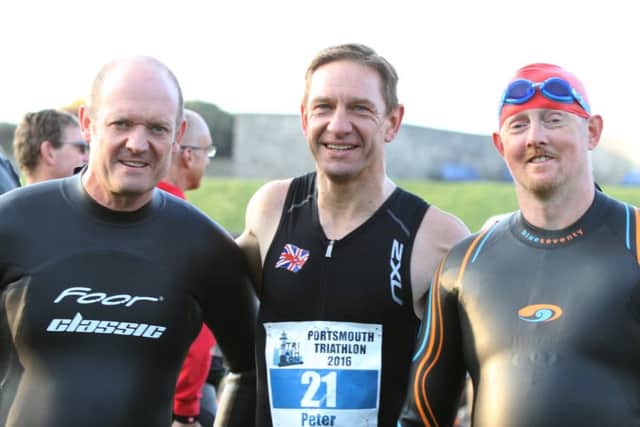 From left: Richard Wheeler, Olympic distance race winner Peter Younghusband and Tim Hardy. Picture: Habibur Rahman (161312-35)