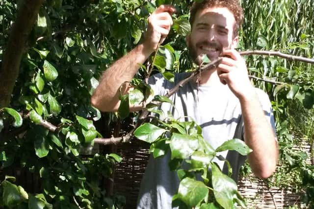 Carols Fernandes volunteering at the Stacey Centre community orchard