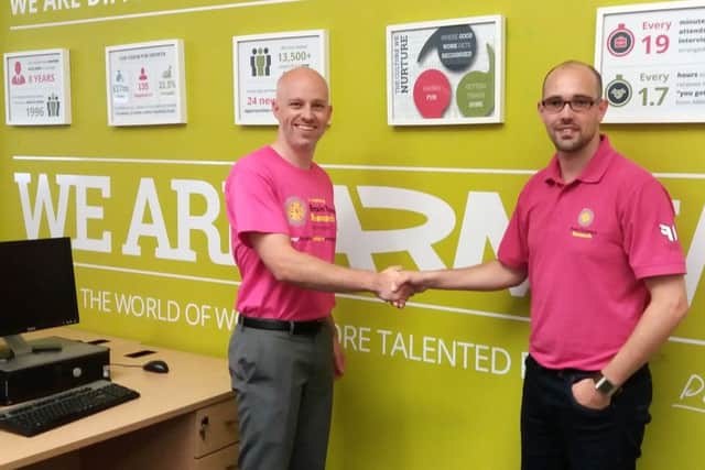From left, Andrew Vaughan from ARM and Tim Green from Brain Tumour Research