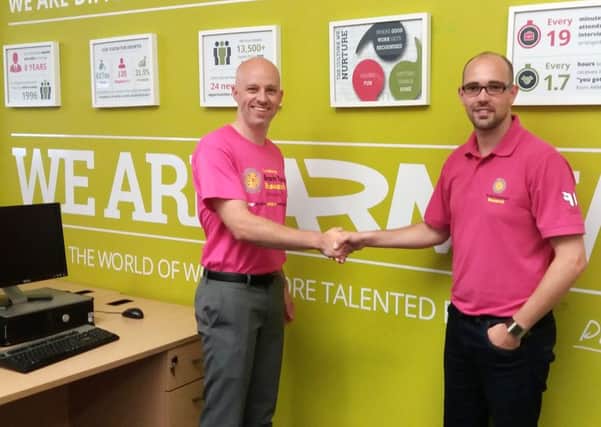 From left, Andrew Vaughan from ARM and Tim Green  from Brain Tumour Research
